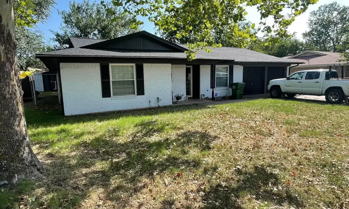 Professional roofing crew working on a residential roof in Port Royal
